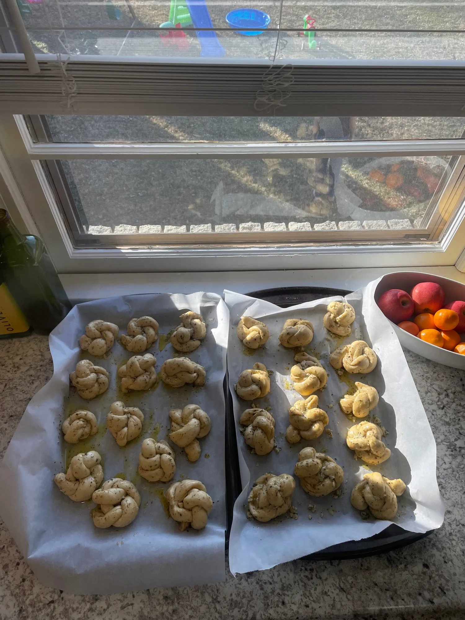 Garlic knots on a baking sheet