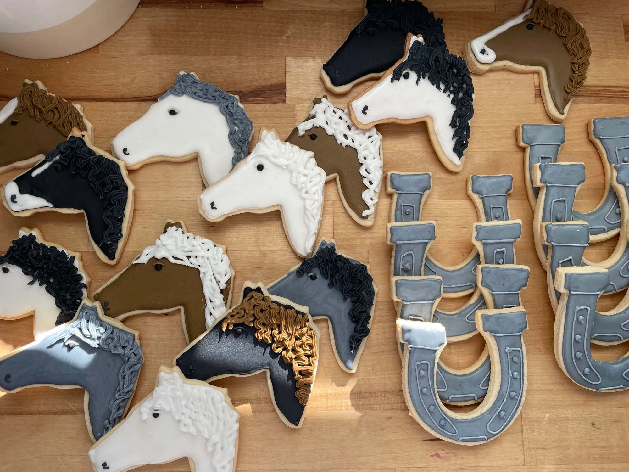 Horse sugar cookies on a board