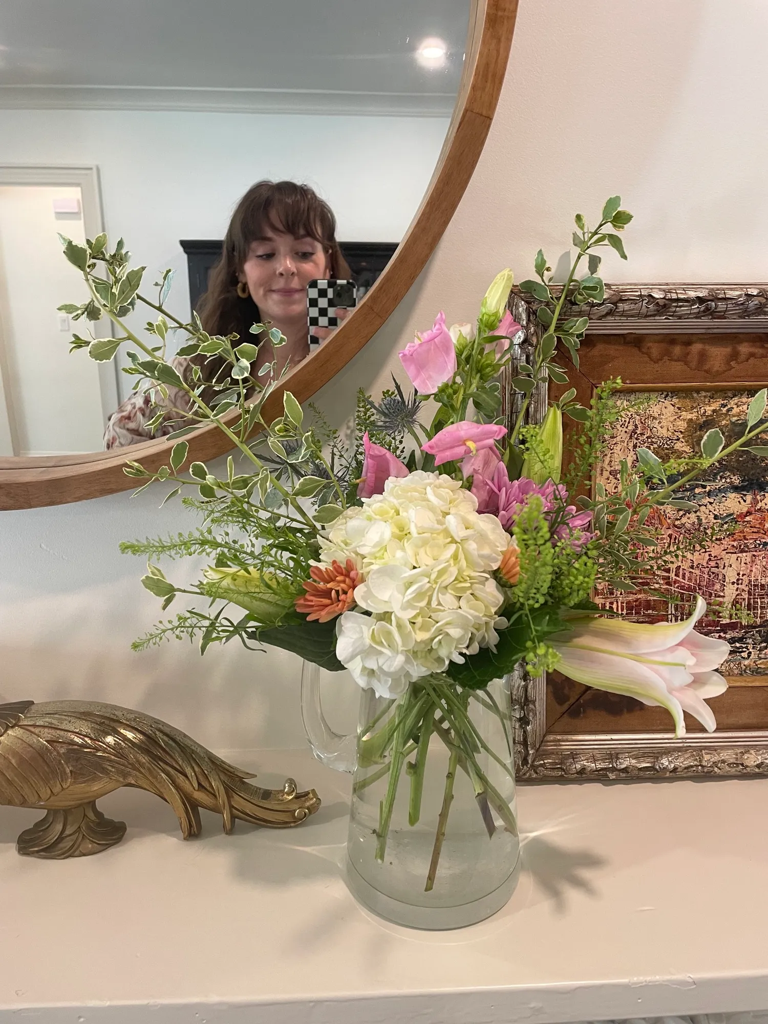 Lilli with flowers reflected in a mirror
