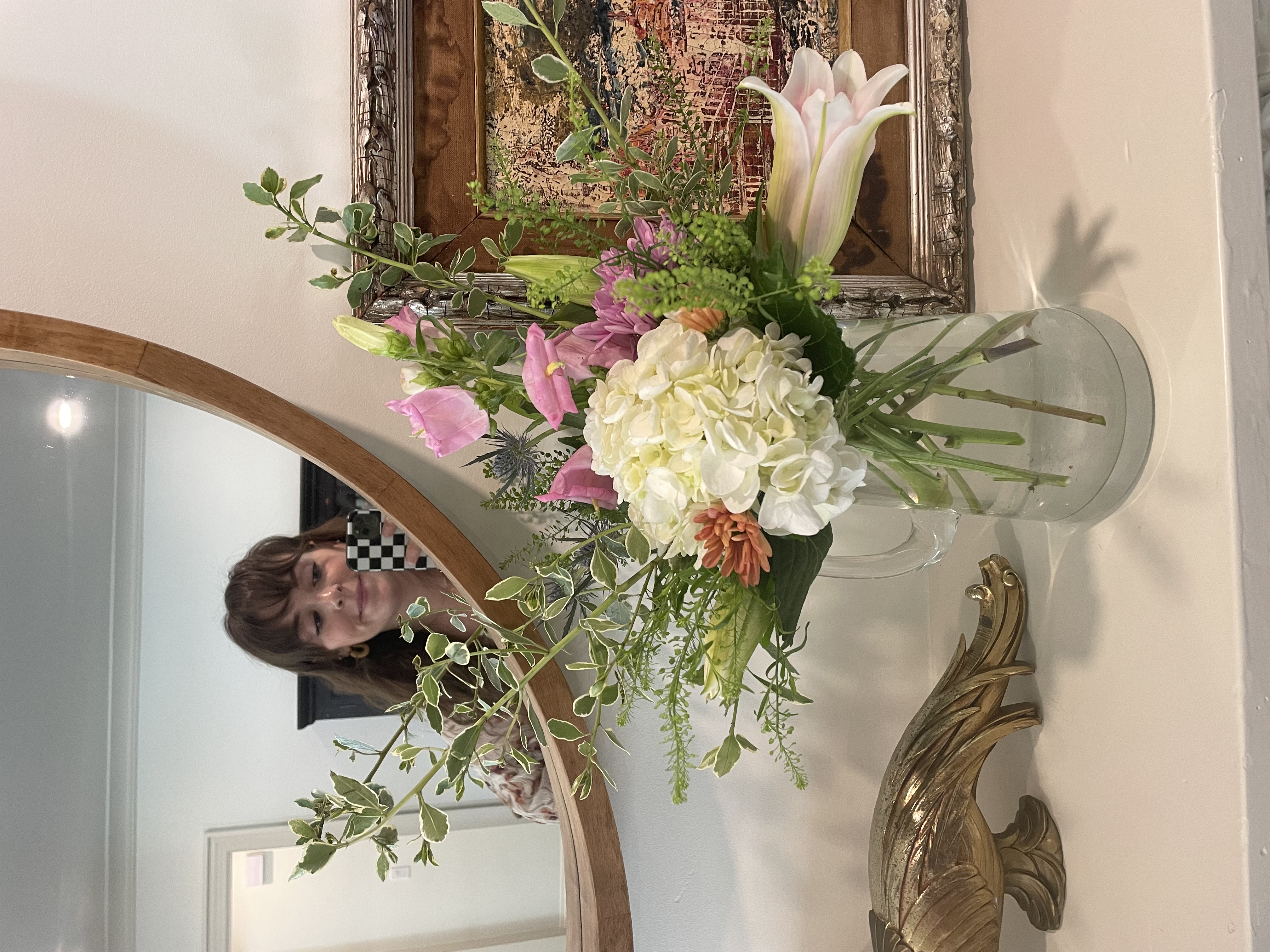 Lilli with flowers reflected in a mirror