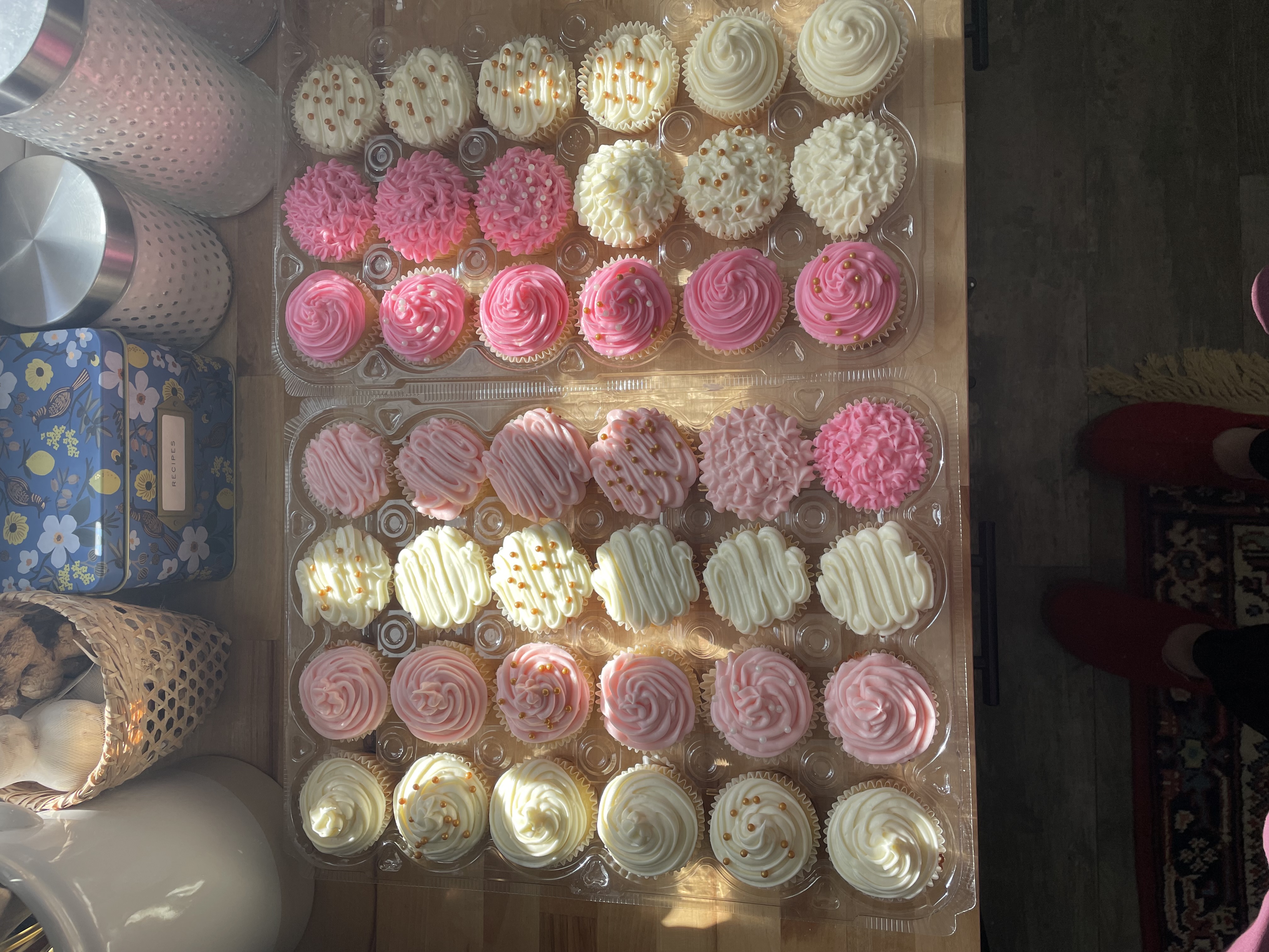 Pink and white frosted cupcakes